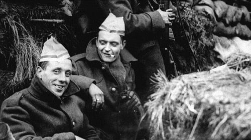 British troops wearing paper Christmas hats on the western front