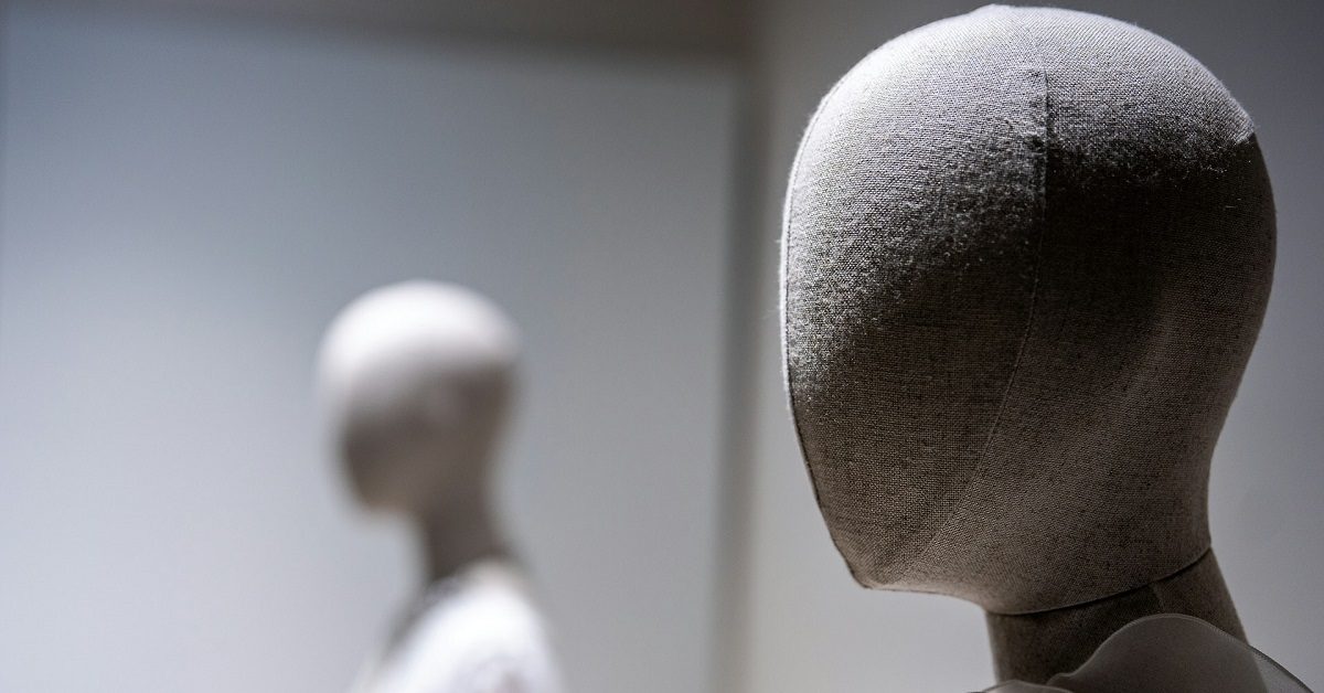 soft mannequins on display in a shop display