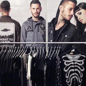 Printed, Custom Coat Hangers On Display - Disturbia Clothing