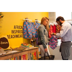 White Wooden Clothes Hangers, Printed With Logo - Okun Africa. Beach. Wear.