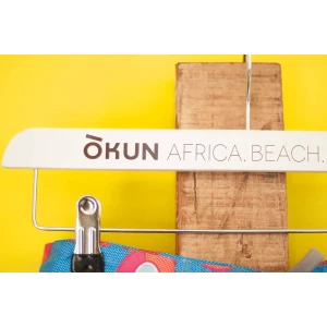 White Wooden Clothes Hangers, Printed With Logo - Okun Africa. Beach. Wear.